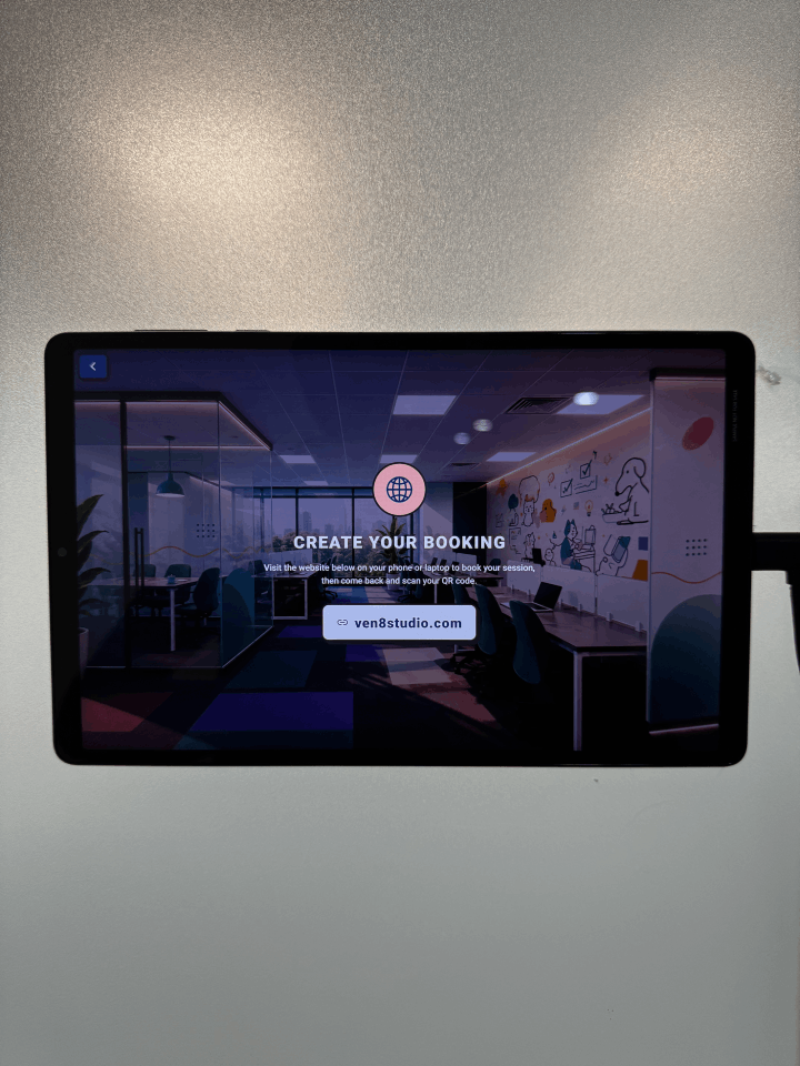 Self check-in tablet at Ven8 Studio — create your booking
